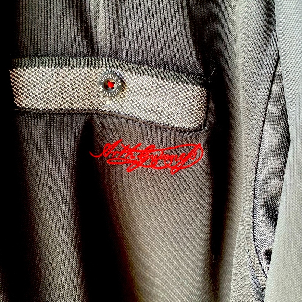 Men's size Large Guinness polo. NWOT.